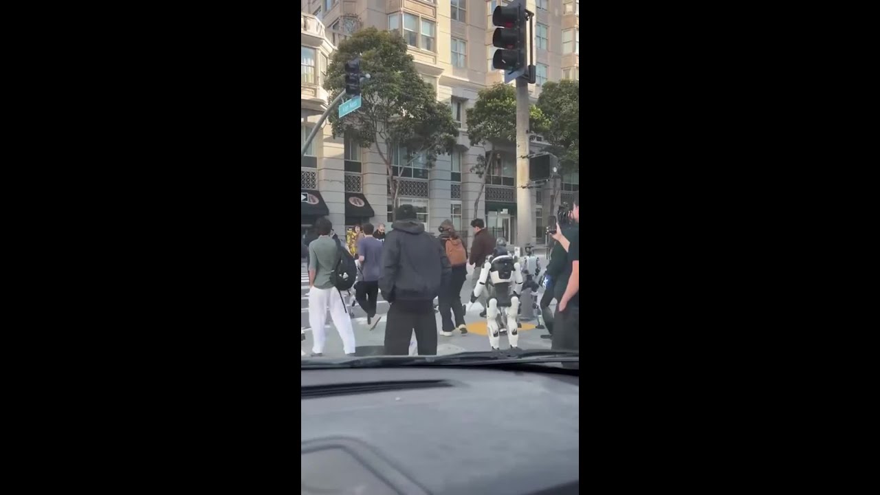 Bizarre scenes as humanoid robots clog San Francisco street Bizarre scenes as humanoid robots clog San Francisco street