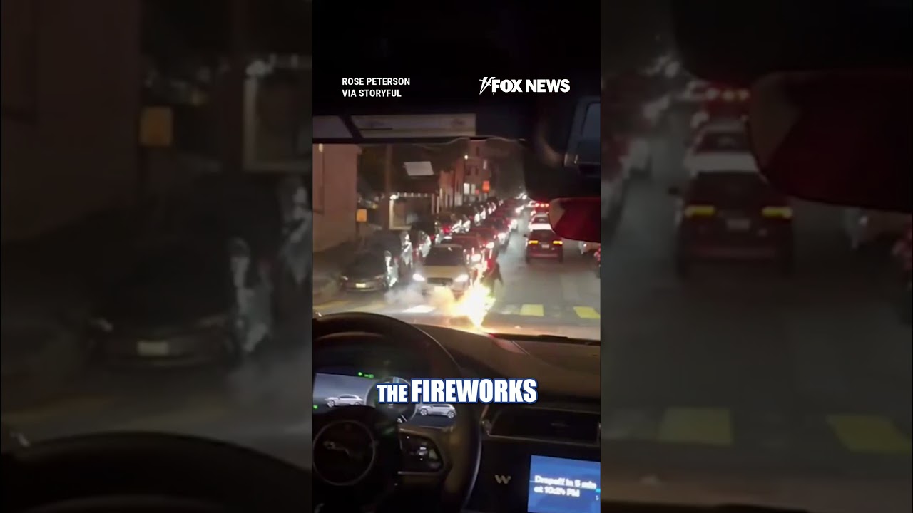 Passengers TERRIFIED as Waymo car drives into live fireworks #shorts #news #foxnews #waymo #viral