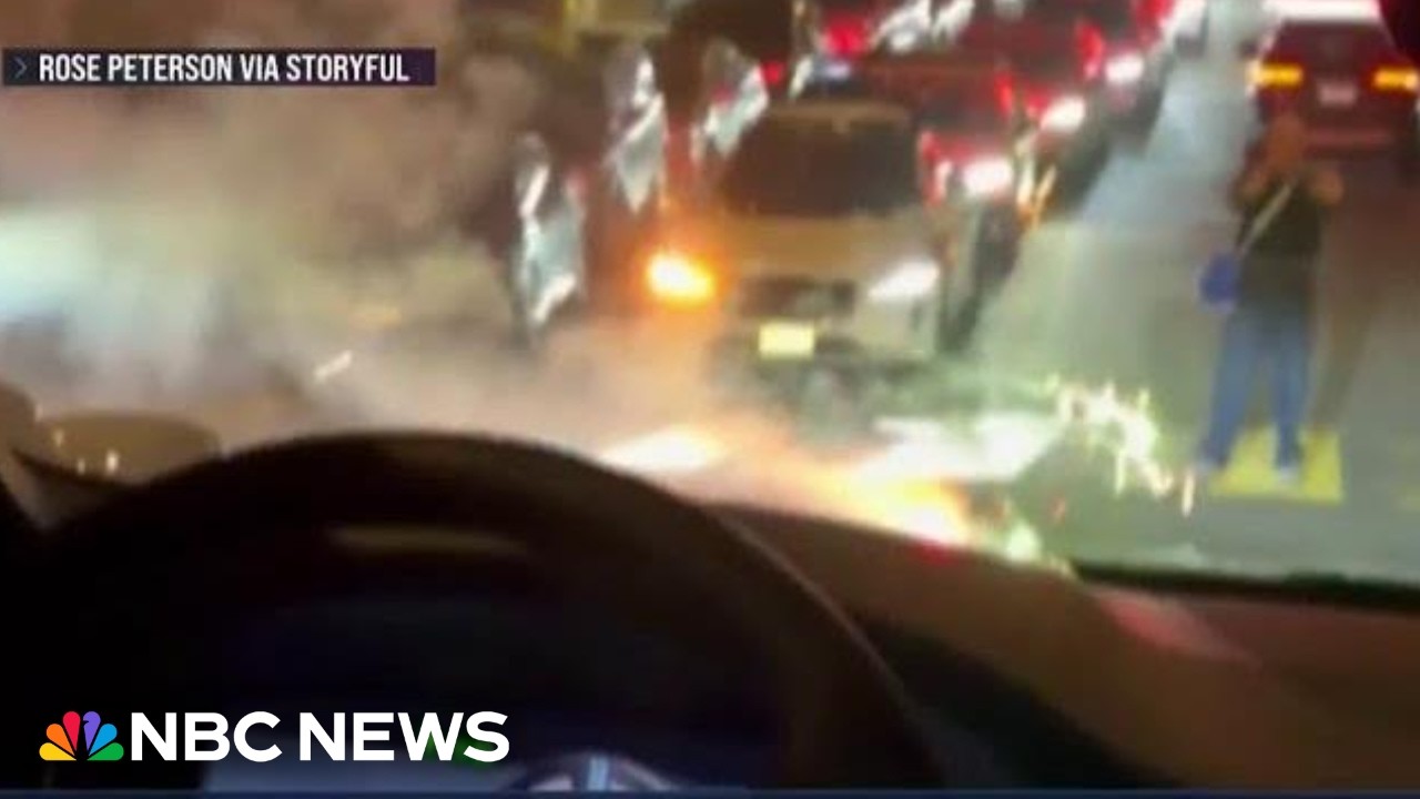 Waymo car travels over lit firework as other cars run out of battery in holiday gridlock Waymo car travels over lit firework as other cars run out of battery in holiday gridlock